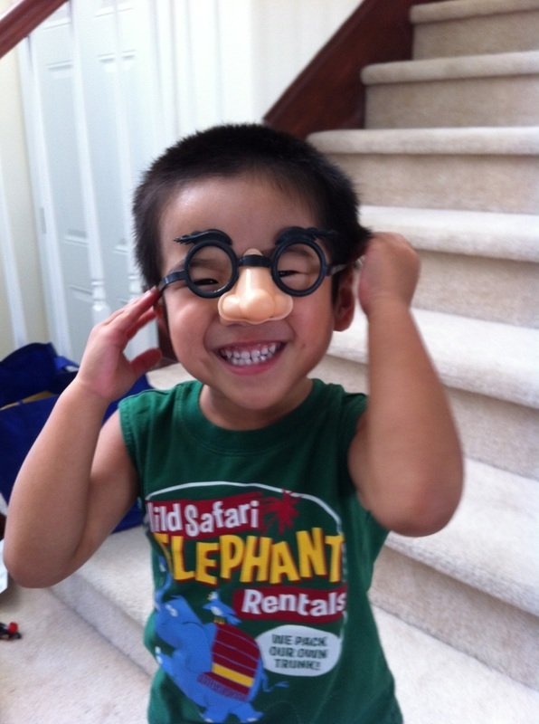 Aidan wearing a funny glasses-and-nose disguise